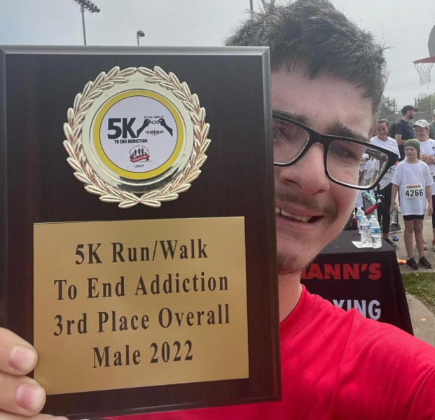 File:Josh holding prize.png