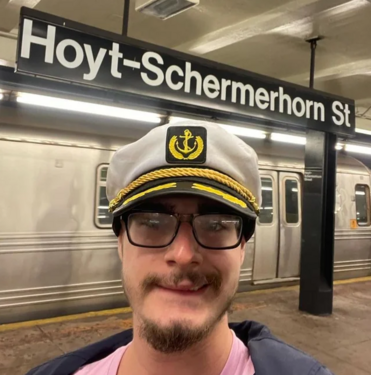 In this photo, major changes are noticeable. Josh has lost the ability to smile properly, and the life has faded from his eyes. His skin has changed colour and his face is slanted to the side. He is also wearing his trademark Captains Hat.
